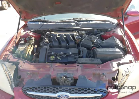 2000 Ford Taurus Se z USA, uszkodzony, nr VIN 1FAFP58S4YA197839